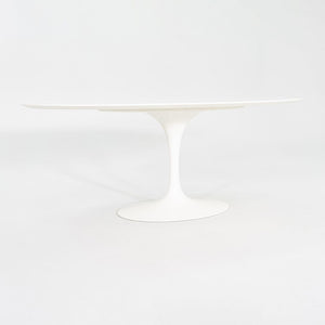 2010s Eero Saarinen for Knoll 78x48 inch Oval Dining table in White Laminate