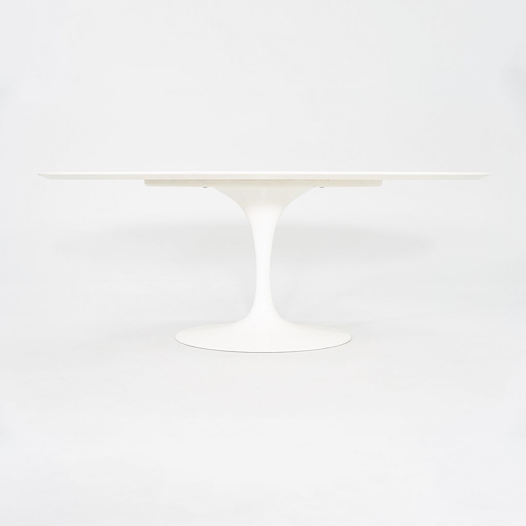 2010s Eero Saarinen for Knoll 78x48 inch Oval Dining table in White Laminate