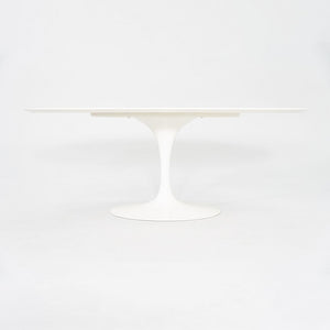 2010s Eero Saarinen for Knoll 78x48 inch Oval Dining table in White Laminate