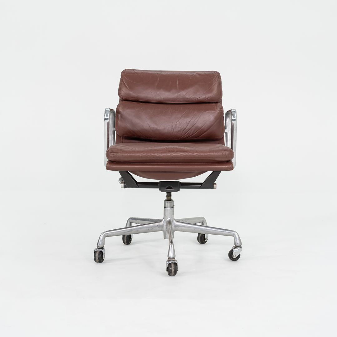 SOLD 1987 Soft Pad Management Chair, EA435 by Ray and Charles Eames for Herman Miller in Red/Brown Leather 2x Available