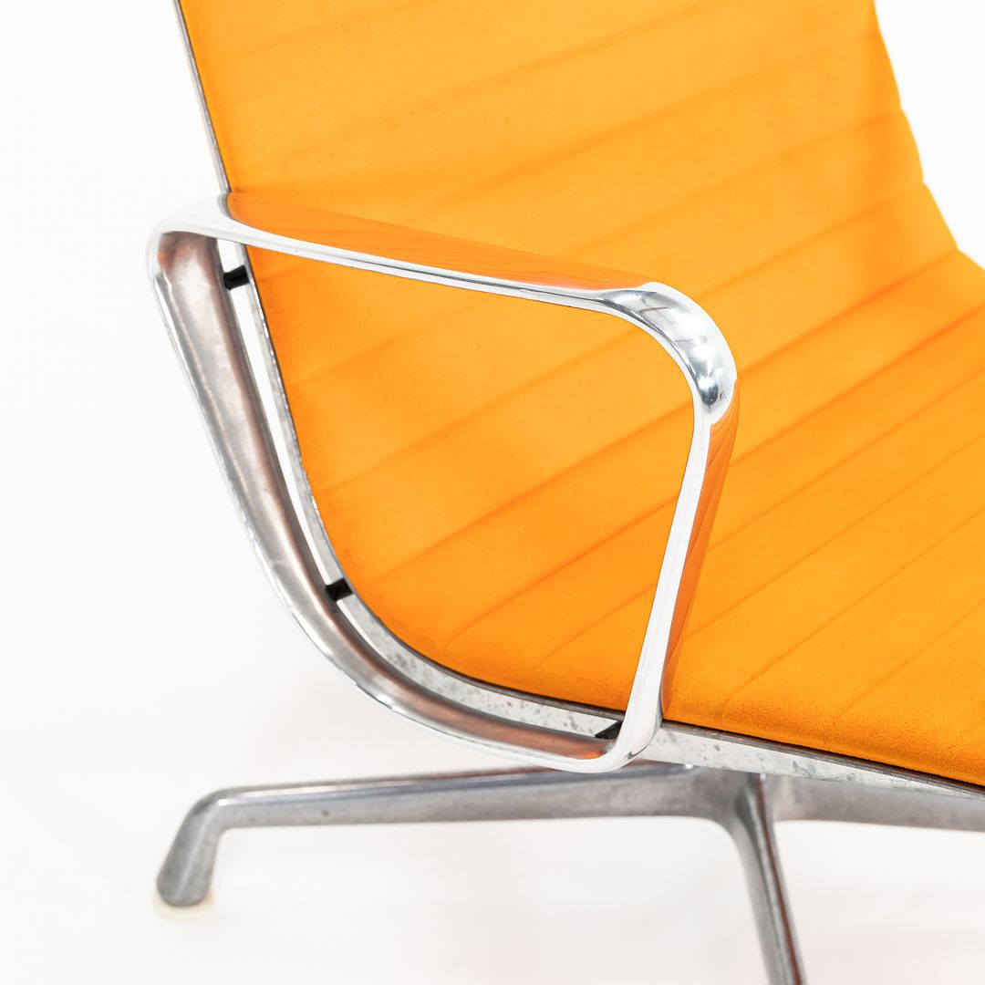 1970s Eames Aluminum Group Lounge Chair, model EA124 by Ray and Charles Eames for Herman Miller in Orange Alexander Girard-Designed Hopsack Fabric