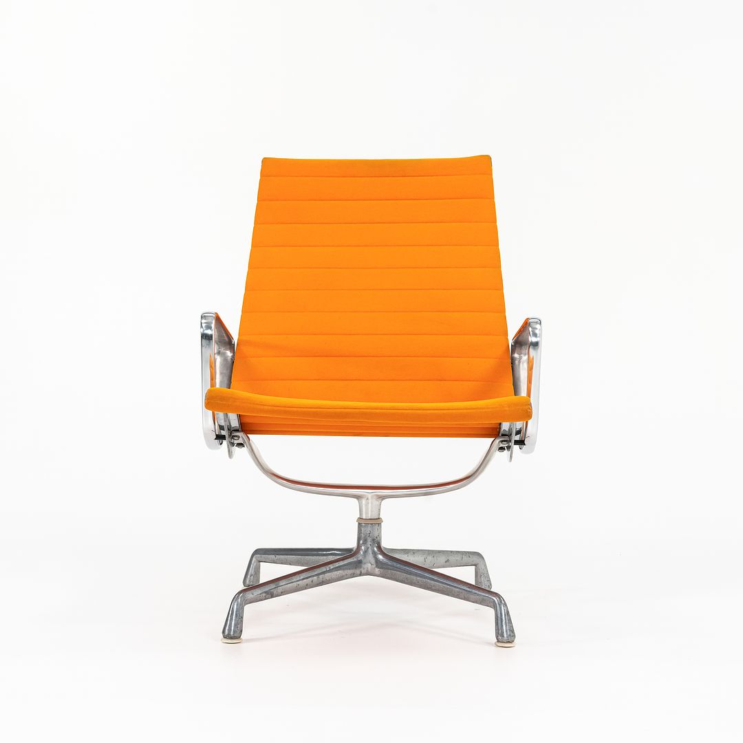 1970s Eames Aluminum Group Lounge Chair, model EA124 by Ray and Charles Eames for Herman Miller in Orange Alexander Girard-Designed Hopsack Fabric