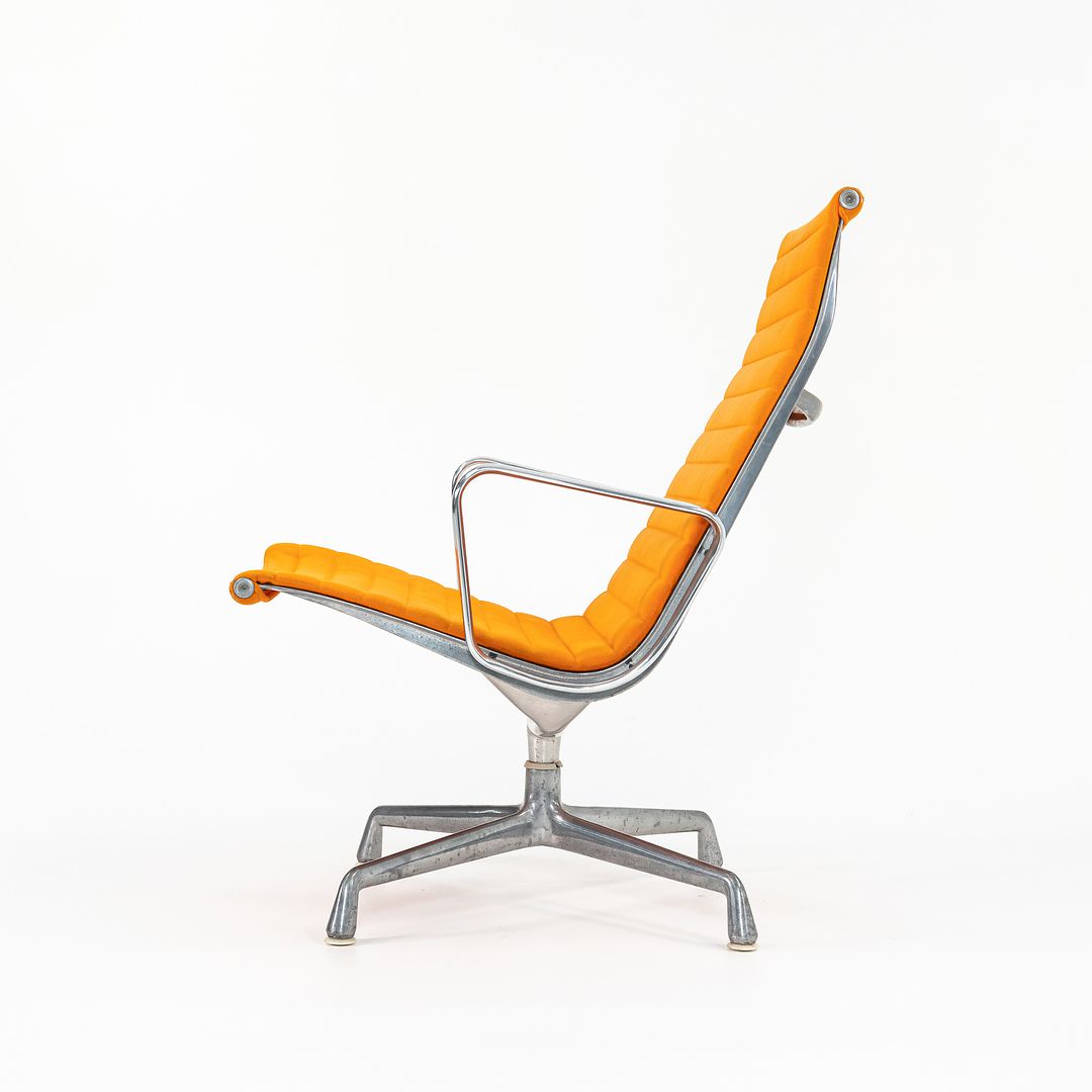 1970s Eames Aluminum Group Lounge Chair, model EA124 by Ray and Charles Eames for Herman Miller in Orange Alexander Girard-Designed Hopsack Fabric