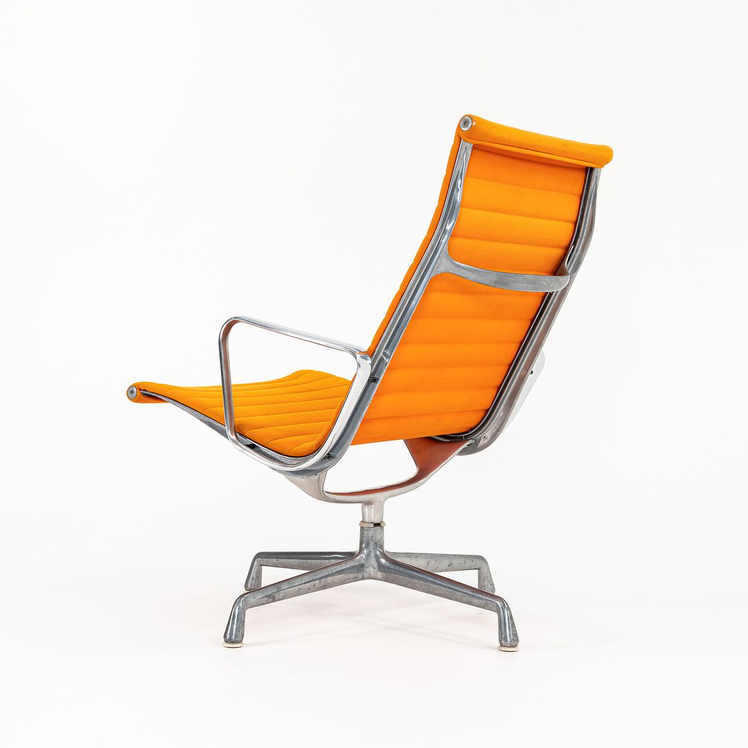 SOLD 1970s Eames Aluminum Group Lounge Chair, model EA124 by Ray and Charles Eames for Herman Miller in Orange Alexander Girard-Designed Hopsack Fabric