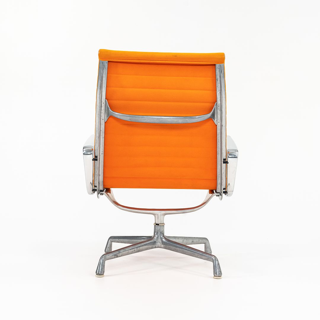 1970s Eames Aluminum Group Lounge Chair, model EA124 by Ray and Charles Eames for Herman Miller in Orange Alexander Girard-Designed Hopsack Fabric