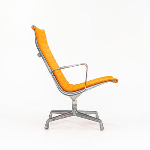 SOLD 1970s Eames Aluminum Group Lounge Chair, model EA124 by Ray and Charles Eames for Herman Miller in Orange Alexander Girard-Designed Hopsack Fabric