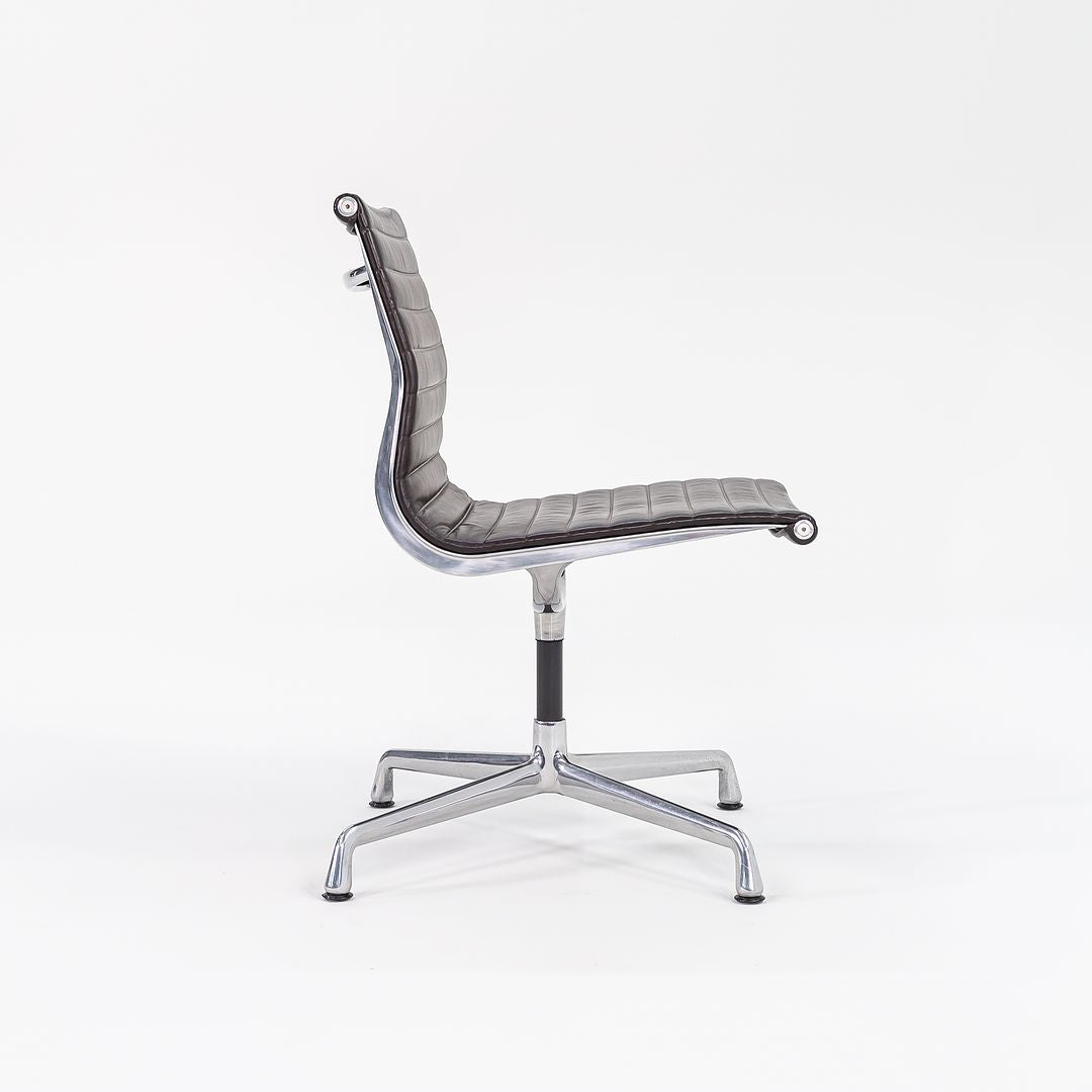 SOLD 2012 Aluminum Group Armless Side Task Chair, Model EA306S by Ray and Charles Eames for Herman Miller in Brown Leather 1x Available