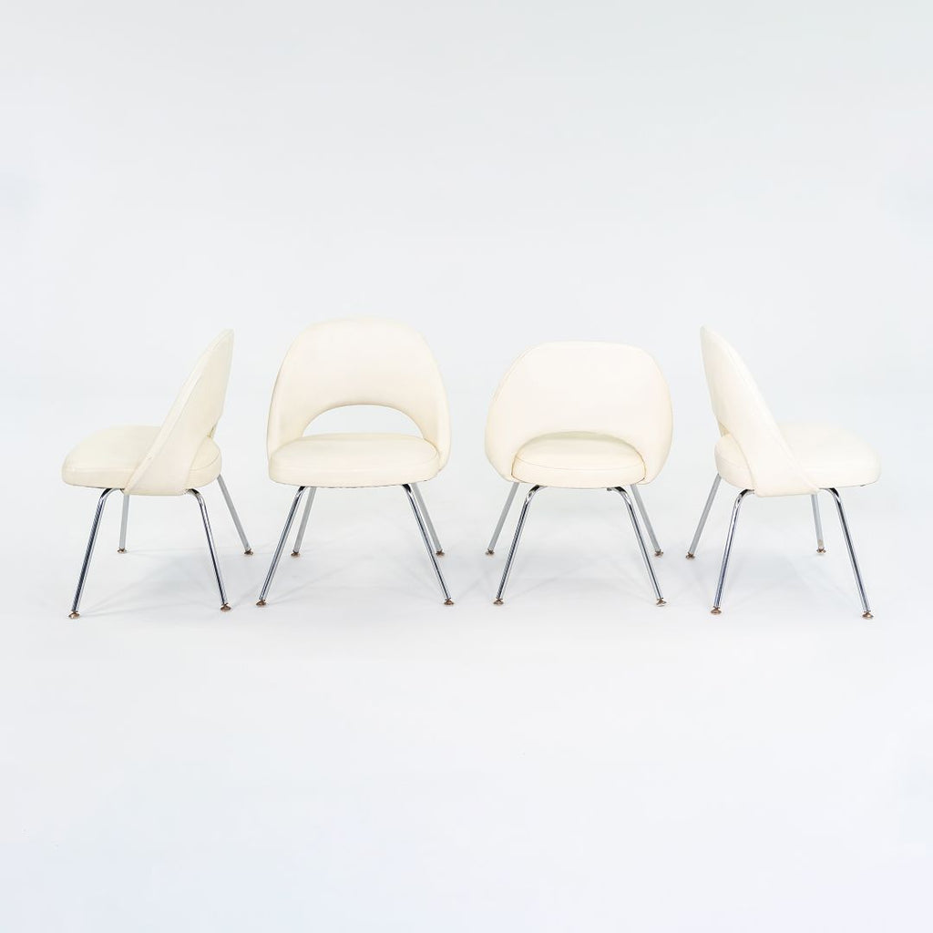 SOLD C. 2008 Eero Saarinen for Knoll Armless Executive Chairs Dining with White Vinyl Upholstery 4x Available