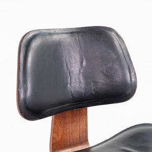 1952 DCW Dining Chair by Charles and Ray Eames for Herman Miller in Walnut with Black Leather Upholstery