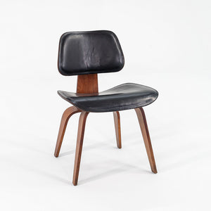 1952 DCW Dining Chair by Charles and Ray Eames for Herman Miller in Walnut with Black Leather Upholstery