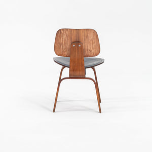 1952 DCW Dining Chair by Charles and Ray Eames for Herman Miller in Walnut with Black Leather Upholstery