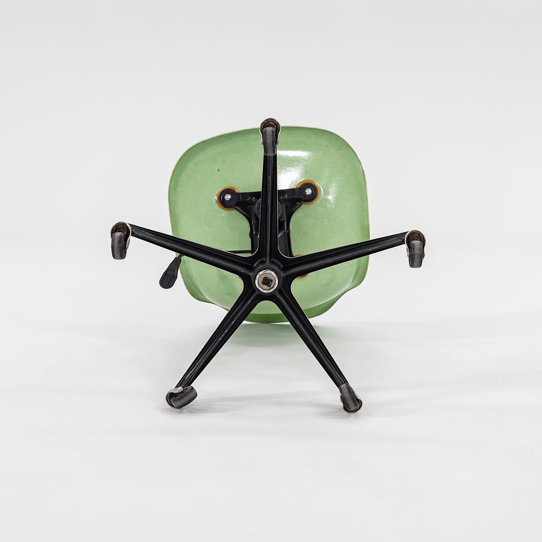 2010s Eames Modernica Fiberglass Side Shell Chairs with Rolling Desk Chair Bases in Light Green 1x Available