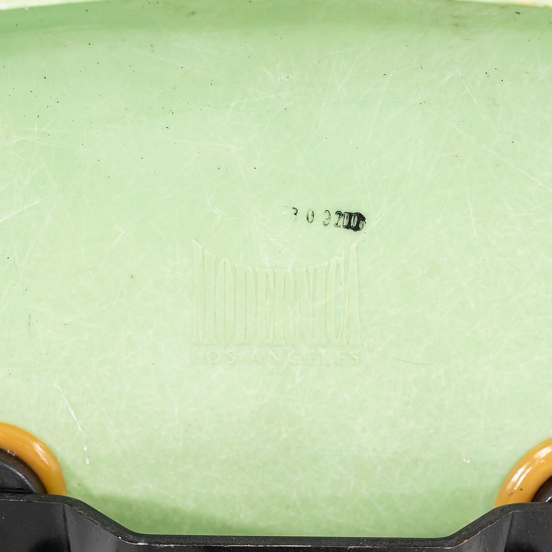 2010s Eames Modernica Fiberglass Side Shell Chairs with Rolling Desk Chair Bases in Light Green 1x Available
