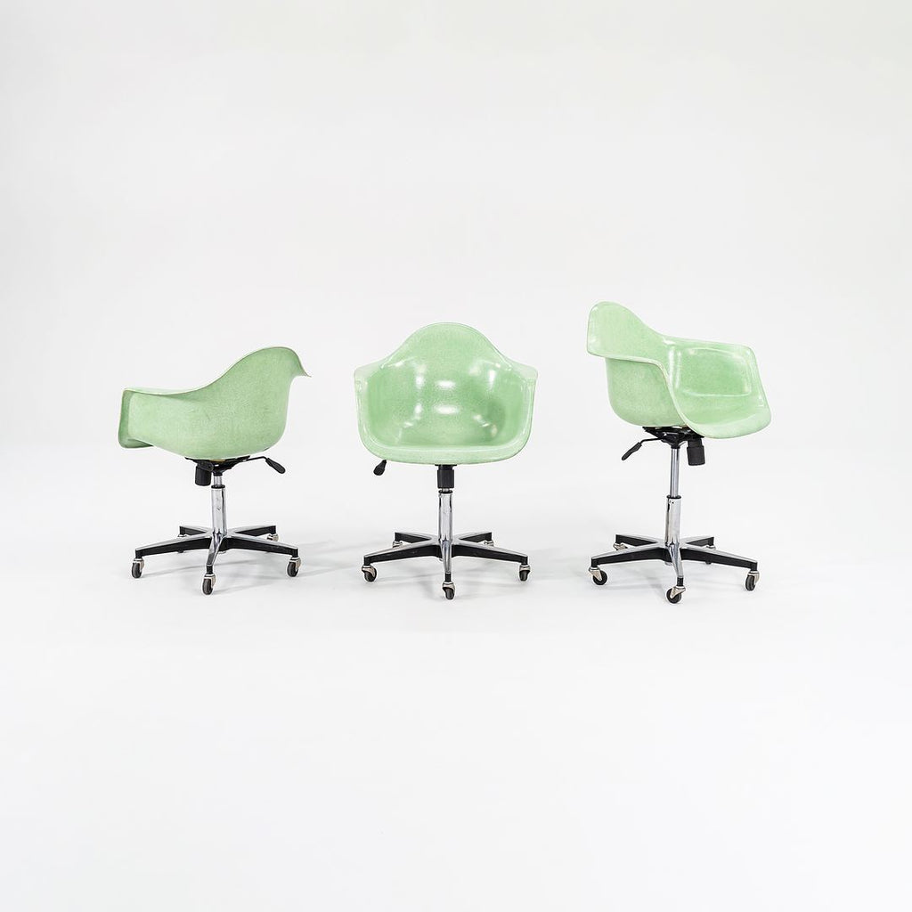 SOLD 2010s Eames Modernica Fiberglass Arm Shell Chairs with Rolling Office Bases in Light Green 3x Available