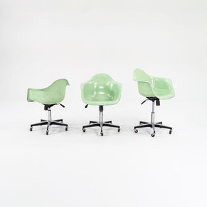 SOLD 2010s Eames Modernica Fiberglass Arm Shell Chairs with Rolling Office Bases in Light Green 3x Available