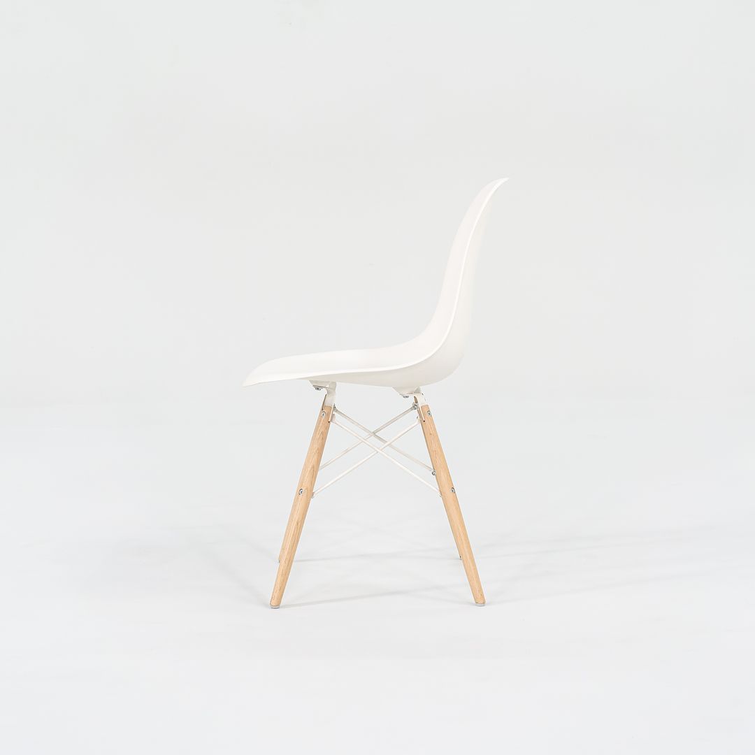 2018 DSW Side Chair with Dowel Base by Ray and Charles Eames for Herman Miller in White Plastic with Oak Base 5x Available