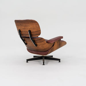 1960s Herman Miller Eames Lounge Chair and Ottoman 670 & 671 by Charles and Ray Eames in Red Leather