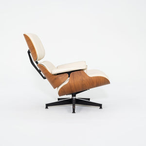 SOLD 2015 Eames Model 670 and 671 Lounge Chair and Ottoman by Ray and Charles Eames for Herman Miller in Walnut and White Leather