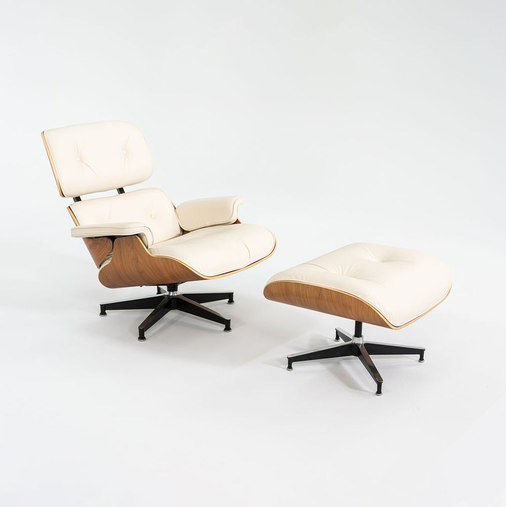 SOLD 2015 Eames Model 670 and 671 Lounge Chair and Ottoman by Ray and Charles Eames for Herman Miller in Walnut and White Leather