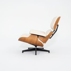 SOLD 2015 Eames Model 670 and 671 Lounge Chair and Ottoman by Ray and Charles Eames for Herman Miller in Walnut and White Leather