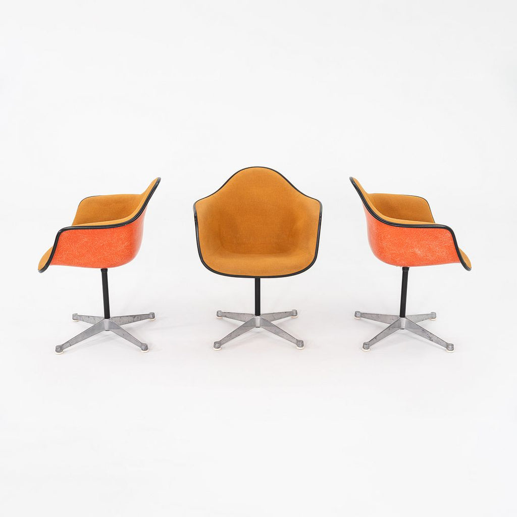 1975 Set of Three Herman Miller Eames Arm Shell Chairs PAC w/ Red/Orange Shells