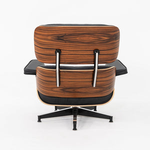 2024 Herman Miller Eames Lounge Chair and Ottoman in Black Leather and Santos Palisander