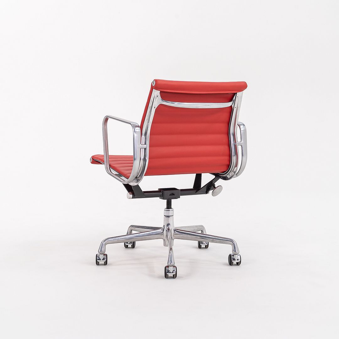 SOLD 2010s Aluminum Group Management Desk Chair, Model EA335 by Charles and Ray Eames for Herman Miller in Red Leather 2x Available