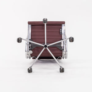 SOLD 2010s Eames Aluminum Group Management Desk Chair by Ray and Charles Eames for Herman Miller in Burgundy Leather