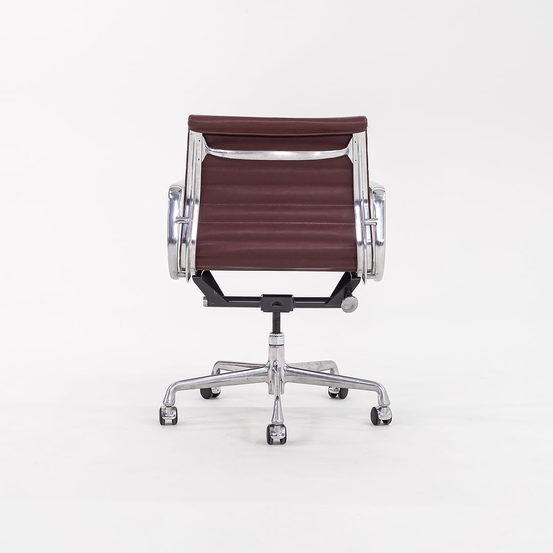 SOLD 2010s Eames Aluminum Group Management Desk Chair by Ray and Charles Eames for Herman Miller in Burgundy Leather