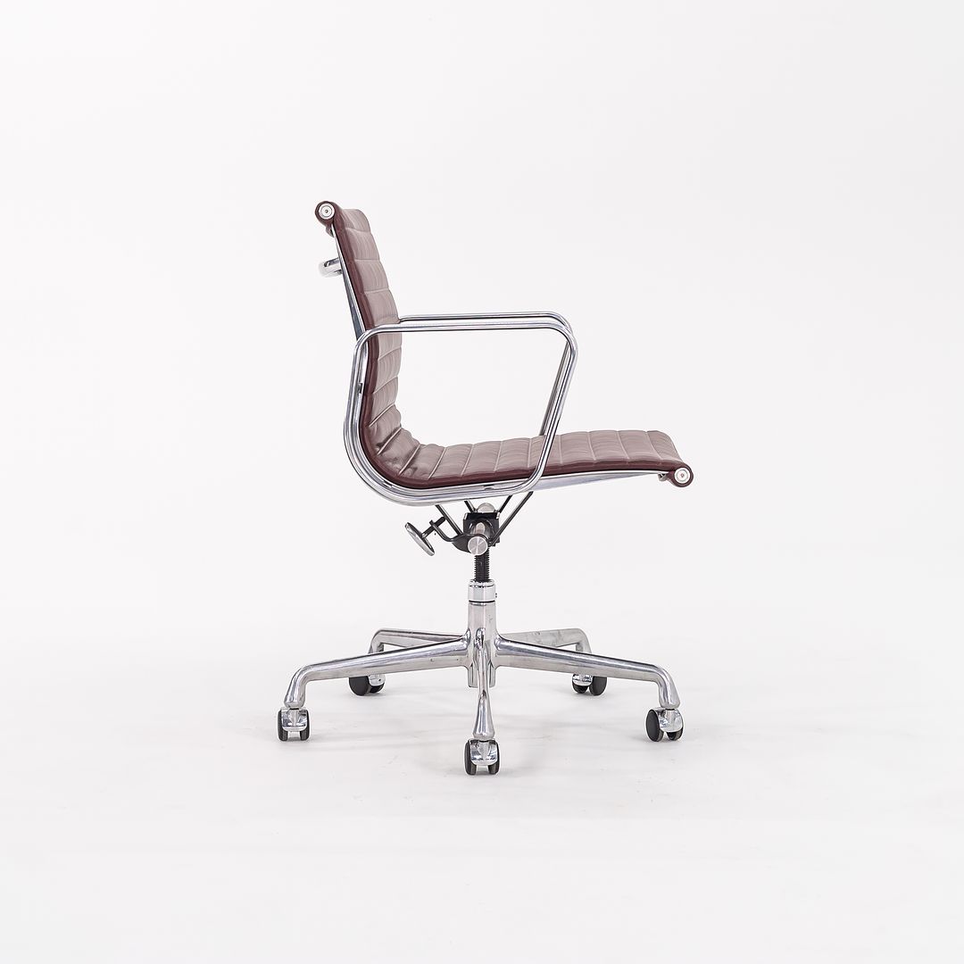 SOLD 2010s Eames Aluminum Group Management Desk Chair by Ray and Charles Eames for Herman Miller in Burgundy Leather