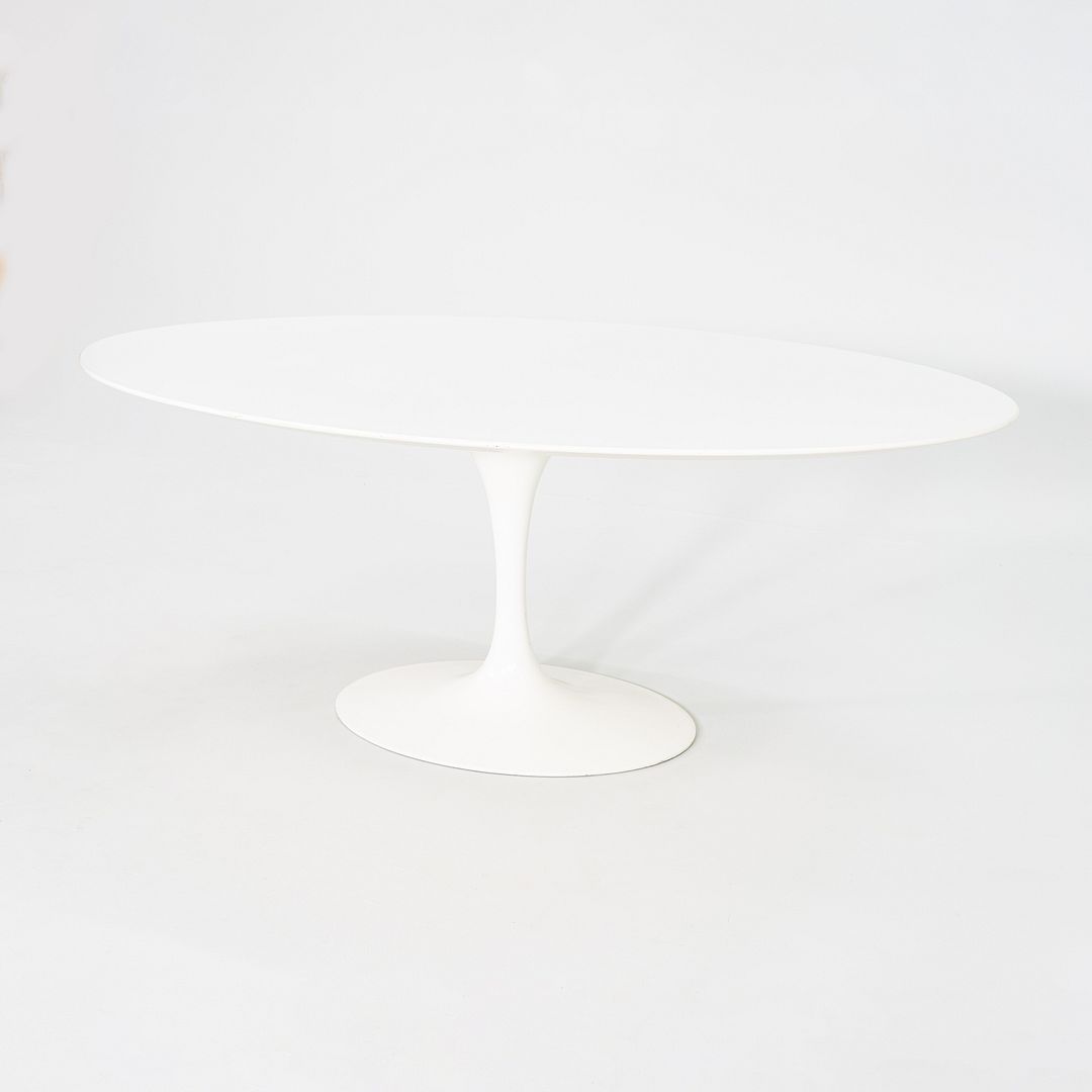 2010s Eero Saarinen for Knoll 78x48 inch Oval Dining table in White Laminate