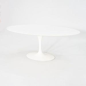 2010s Eero Saarinen for Knoll 78x48 inch Oval Dining table in White Laminate