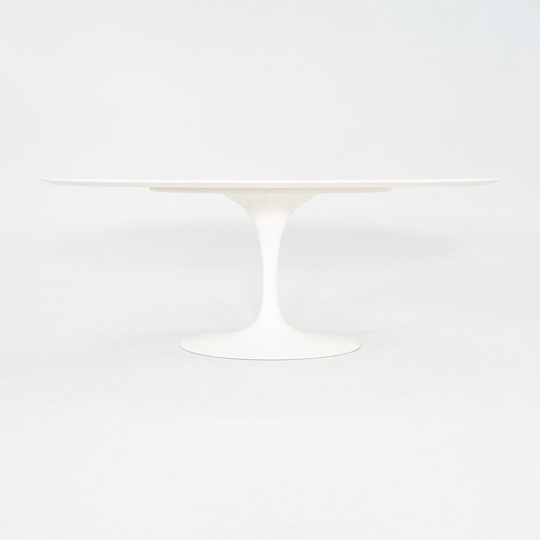 2010s Eero Saarinen for Knoll 78x48 inch Oval Dining table in White Laminate