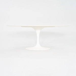 2010s Eero Saarinen for Knoll 78x48 inch Oval Dining table in White Laminate