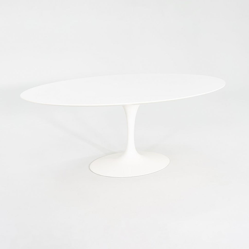 2010s Eero Saarinen for Knoll 78x48 inch Oval Dining table in White Laminate