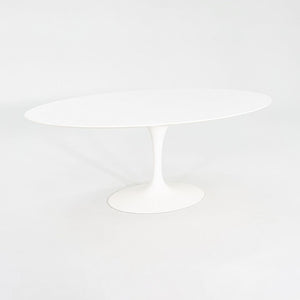 2010s Eero Saarinen for Knoll 78x48 inch Oval Dining table in White Laminate