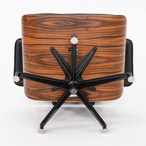2024 Herman Miller Eames Lounge Chair and Ottoman in Black Leather and Santos Palisander