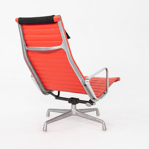 1970s Herman Miller Eames Lounge Chair in Red Naugahyde with Black Fabric Pillow