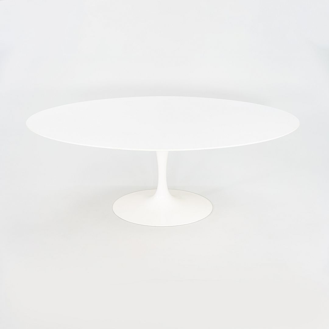 2010s Eero Saarinen for Knoll 78x48 inch Oval Dining table in White Laminate