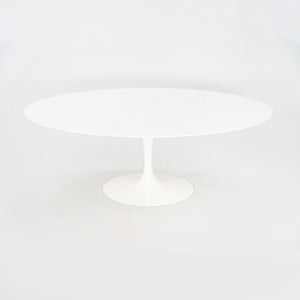 2010s Eero Saarinen for Knoll 78x48 inch Oval Dining table in White Laminate