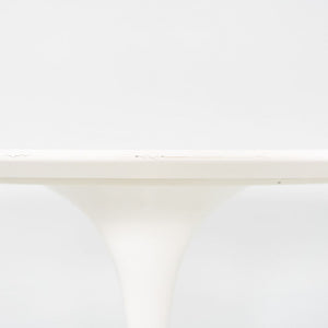 2010s Eero Saarinen for Knoll 78x48 inch Oval Dining table in White Laminate
