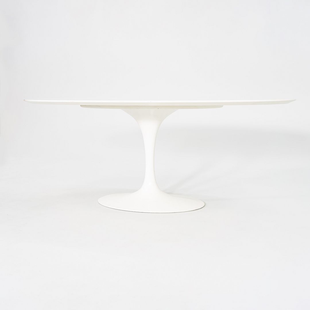 2010s Eero Saarinen for Knoll 78x48 inch Oval Dining table in White Laminate