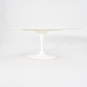 2010s Eero Saarinen for Knoll 78x48 inch Oval Dining table in White Laminate