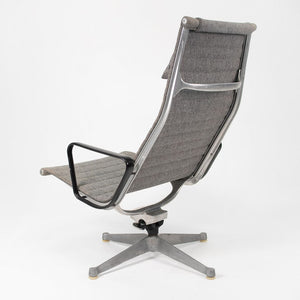 SOLD 1960s Aluminum Group Lounge Chair and Ottoman by Charles and Ray Eames for Herman Miller in Gray Fabric