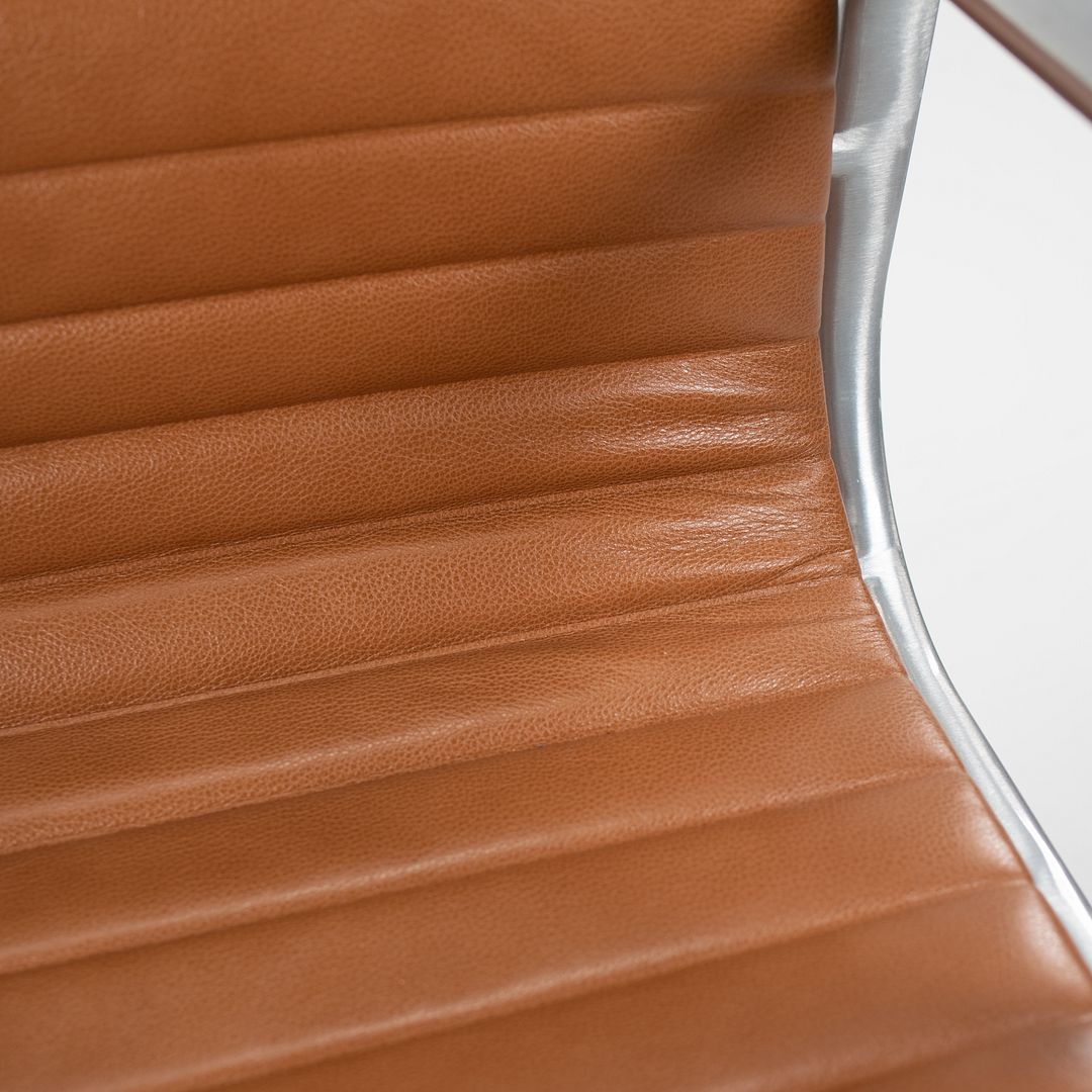 SOLD 2011 Aluminum Group Management Chair by Charles and Ray Eames for Herman Miller in Special Caramel Leather