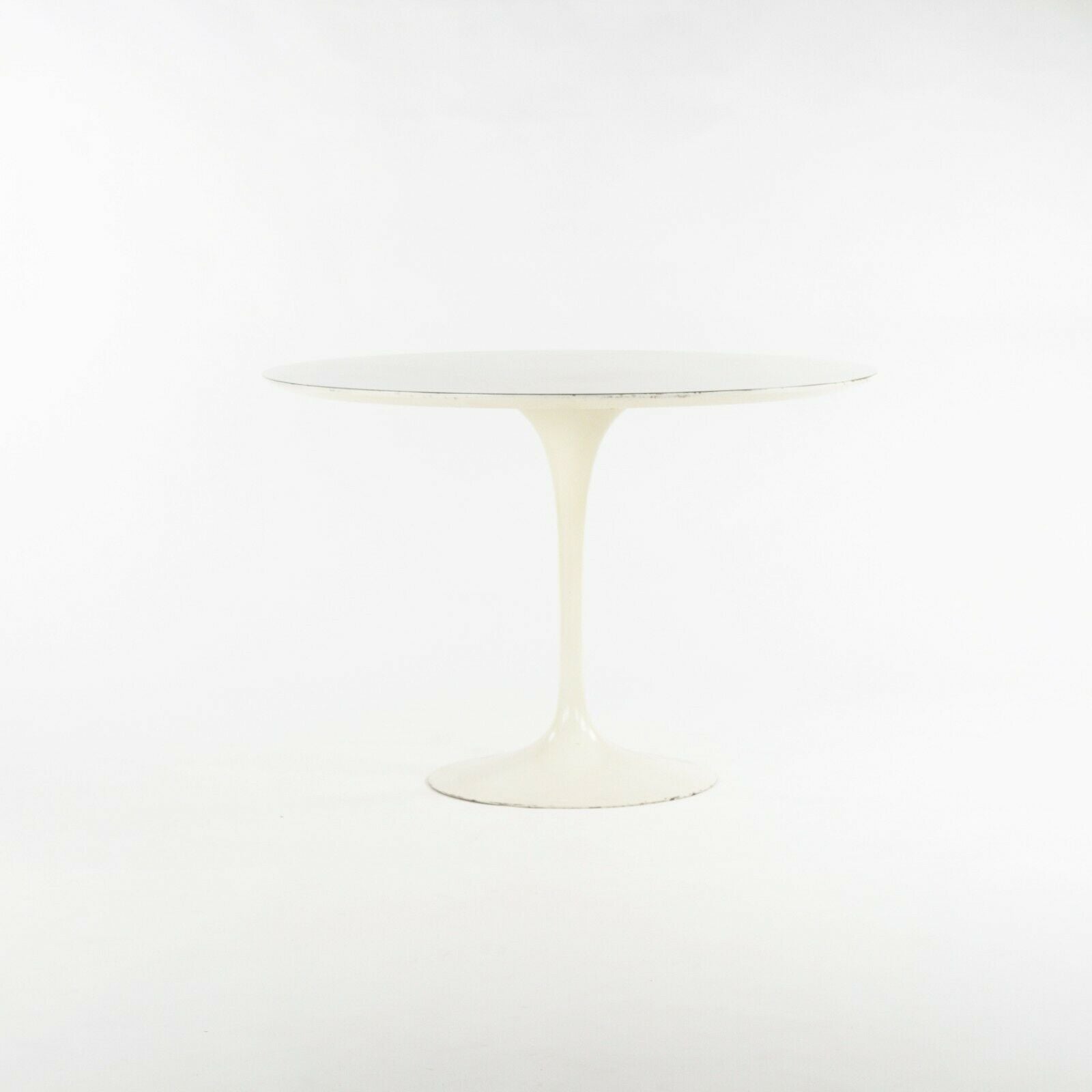 SOLD 1960s Eero Saarinen for Knoll Tulip Dining Table and Four White Tulip Side Chairs