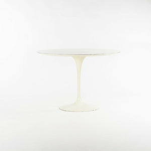 SOLD 1960s Eero Saarinen for Knoll Tulip Dining Table and Four White Tulip Side Chairs
