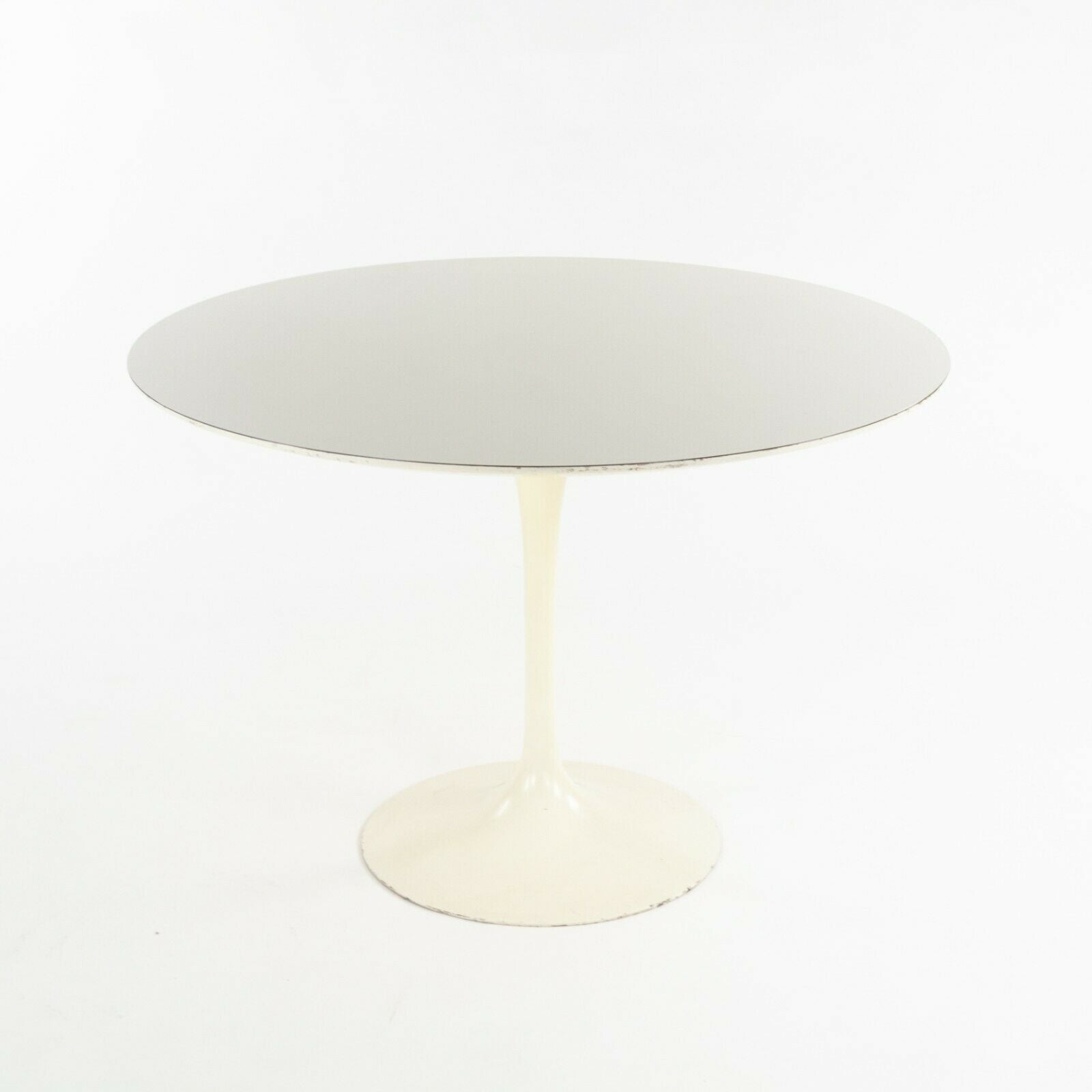 SOLD 1960s Eero Saarinen for Knoll Tulip Dining Table and Four White Tulip Side Chairs