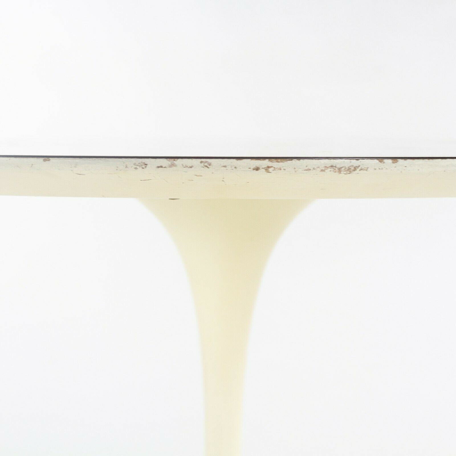 SOLD 1960s Eero Saarinen for Knoll Tulip Dining Table and Four White Tulip Side Chairs