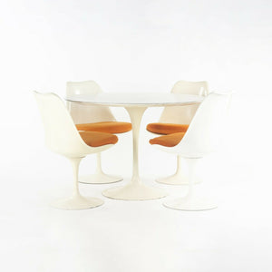 SOLD 1960s Eero Saarinen for Knoll Tulip Dining Table and Four White Tulip Side Chairs